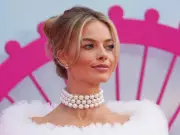 Margot Robbie Stuns in Sheer Alexander McQueen Lace for Wuthering Heights Promo