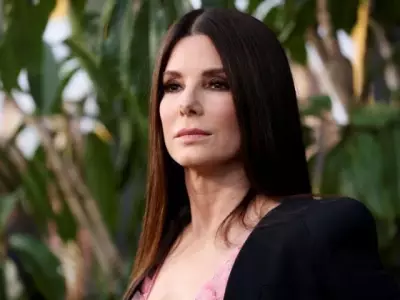 Sandra Bullock on Balancing Motherhood and Filming: 'I'm Raising My Children'