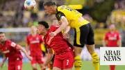 Dortmund thrash Freiburg 4-0 to secure Champions League spot