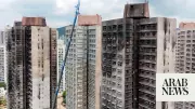 Hong Kong Fire Victims Return to Devastated Homes, Confront Trauma and Loss