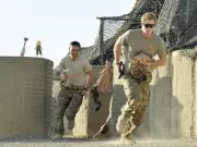 Prince Harry and Meghan Markle to Produce Film on Afghan War Memoir