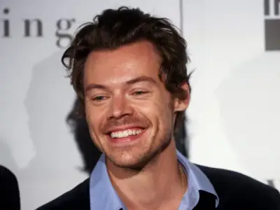 Harry Styles Falls on Stage at Wembley After Choking on Water During Concert