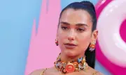 Dua Lipa and Callum Turner Arrive in Sicily for Wedding Celebrations