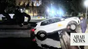Frenchman Eating McDonald's After Crashing into Sydney Fountain