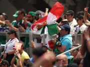 Mexican Fans Cheer for Iran in World Cup Match Against Belgium