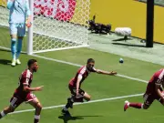 Qatar's Khoukhi Stuns Switzerland with Late Equalizer in World Cup Draw