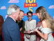 Taylor Swift Asks Tom Hanks to Sign Toy Story VHS at Premiere