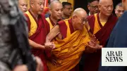 Tibet's exiled leader Penpa Tsering sworn in for second term as Dalai Lama watches