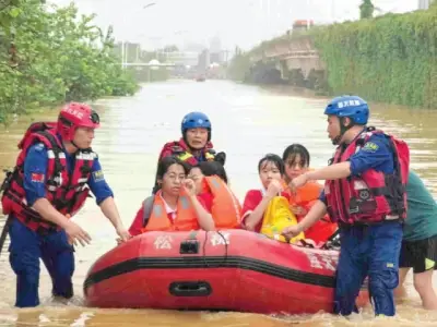 China Floods Kill 17, Dam Bursts, Thousands Evacuated in Guangxi