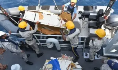 Families of Crew Aboard Crashed Cargo Plane Face Agonising Wait