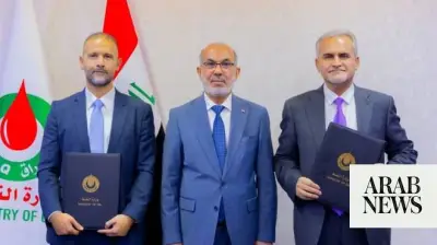 Iraq and Halliburton sign deal to develop two oil fields